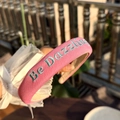 Pink padded headband with blue Be Dazzling embroidery on soft textured fabric - Rose Pink High-Top Headband with Blue Letters Embroidery
