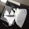 Three-piece white bikini set with halter top, bottom and sarong in textured crepe fabric - Pure White