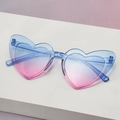 Chic heart-shaped sunglasses featuring a dreamy blue and pink gradient lens and frame - Blue to Pink Gradient