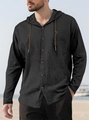 Detail of black cotton linen shirt featuring wooden buttons and adjustable drawstring hood - S / Tops / Black