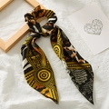 Satin ponytail hair scrunchie with scarf streamers in black, gold, and orange pattern - Dark Yellow Leopard