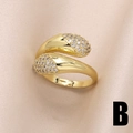 Elegante vergulde open ring met bypass druppelontwerp en sprankelende zirkonia pavé - Waterdruppel Wikkelstijl (B)