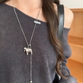 Korean style stainless steel horse pendant long necklace on model for women - Polished Smooth Style / Silver