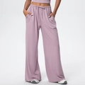 Detail of lavender wide-leg trousers with elastic drawstring waist and side pockets - Lavender