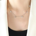 Silver heart pendant necklace with shimmering zircons worn by a female model - 40+5cm / Steel