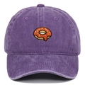 Detail of colorful donut embroidery on purple washed cotton baseball cap with retro texture - Purple