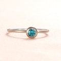 Minimalist silver stainless steel ring with bezel-set lake blue round birthstone - US Size 7 / Steel-Deep Blue (Dec)