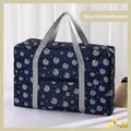Navy blue travel bag with white and yellow daisy floral patterns and gray handles - Navy Daisy