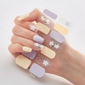 Macro shot of DQ-20 nail stickers featuring yellow and lavender patches with white flowers - |envelope Bag Packaging-dq-020