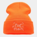 Detailed close-up of Cat Mom white embroidery on an orange ribbed knit beanie hat - One Size / Orange