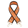 Close-up of orange bag strap with leopard star patterns and gold metal buckles - Silver Clasp / Light Orange