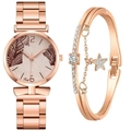 Detail of rose gold quartz watch with palm leaf dial and sparkling star bracelet - Brown + Bracelet