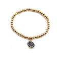 Elastic gold bead bracelet with a black enamel smiley face charm for women - Black Enamel Smiley