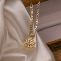 Gold plated evil eye sun pendant necklace with blue zircon on white elegant satin fabric - Evil Eye Necklace