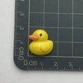Top view of mini resin yellow duck charm on scale mat showing 2cm size detail - 5*Duck
