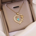 Detail of 18K gold heart pendant necklace with blue Fatima hand and rose charm in jewelry box - 7# Blue Hamsa Hand