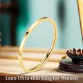 Minimalist 1mm gold titanium steel ring with high-polished finish for women - US 10 / 1mm / Gold