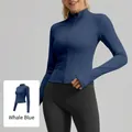Slim fit yoga jacket for women in whale blue featuring a mock neck and zipper closure - S / Tops / Whale Blue