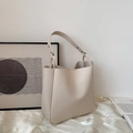 Minimalist beige PU leather tote bag with metallic studs and large shoulder strap - Beige