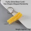 Realistic dried tofu skin keychain made of PVC resin, measuring 6cm long and 11g in weight - Keychain style