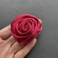 Detailed close-up of a handmade red satin rose brooch with layered fabric petals - Large 5.5CM / Burgundy