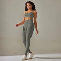 Close-up of seamless gray yoga set featuring V-neck sports bra and high-waisted leggings - S / Top And Bottom / Cami Bra + Long Pants / Dark Gray