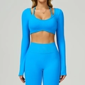 Detail of electric blue seamless yoga set showing double-layer cropped top and leggings - M / Electric Blue