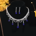 Silver bridal jewelry set featuring blue teardrop stones and sparkling rhinestones - Glamorous Dangle Set / Blue