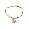 Bracelet élastique doré à perles minimaliste avec un pendentif marguerite en émail violet - Violet