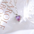 Macro shot of purple heart zircon pendant necklace with intricate silver diamond settings - Necklace / Silver Base Purple