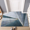 Modern rectangular door mat with blue, grey, and gold geometric pattern on wood floor - Splicing Arrows