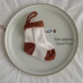 Knitted Christmas stocking ornament in white and brown, 12x7cm decorative hanging piece - White Brown Patchwork Large Sock