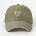 Close-up of soft-top washed cotton baseball cap with white heart embroidery detail - One Size / Dark Khaki