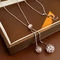 Collana a Y regolabile in acciaio al titanio argento con fibbia a pavé e sfere traforate - Argento