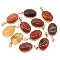 Oval natural agate crystal stone pendants with gold plated metal edges in warm red tones - Red Agate