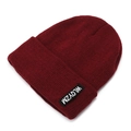 Classic burgundy knit beanie featuring a ribbed texture and white lettered black patch - One Size / Red