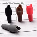 Juego de tapones de silicona para vino con asa en negro, marrón, rojo y gris - Versión con asa / Color Aleatorio