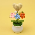 Handmade crochet heart potted plant with colorful flowers in a white ceramic base - Yellow Heart