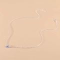Bohemian silver clavicle necklace featuring a vintage blue evil eye pendant on fine chain - Silver