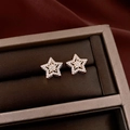 Macro shot of gold star stud earrings with pave zircon and hollow double layer design - Silver Needle-Gold-Double Hollow Star(53#)