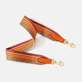 Detail of colorful striped woven strap with orange leather and gold swivel hooks - Standard Type / Orange Gold Buckle