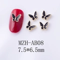 Macro shot of 7.5x6.5mm black enamel butterfly nail charms with gold metal edges - Black Gold Edge Large Butterfly Style (AB08)