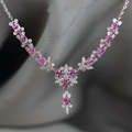 Luxury butterfly necklace with pink diamonds and white pavé crystals on grey velvet - Length approx. 40+5cm / Pink