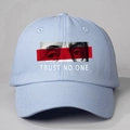 Light blue baseball cap with eye print and Trust No One text on a curved brim hat - One Size / Sky Blue