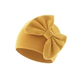 Detailed view of the soft ribbed texture and large bow on this warm ginger baby hat - Ginger (Bow Turban Hat)
