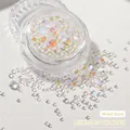 Macro shot of iridescent mermaid glass beads in a clear jar for nail art and DIY crafts - Paradise Shine