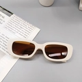 Chic cream white rectangle kids sunglasses with brown lenses on magazine background - Off White