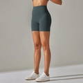 Detailed side view of high-waisted dark grey yoga shorts with seamless high elasticity finish - Wood Green