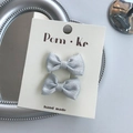 Pair of sparkling silver bow hair clips for girls on a premium display card holder - Fabric Bow / Silver