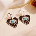 Asymmetric evil eye earrings with black heart charms and cross fleur-de-lis studs - Steel Color Evil Eye Earrings